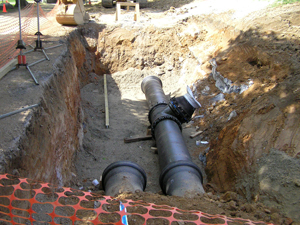 Water pipes exposed in the ground