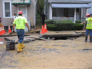 Workers installing water pipes